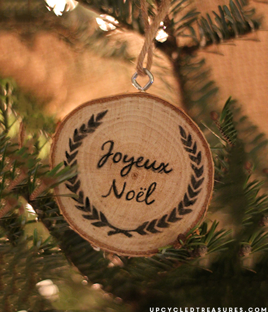 Take a look at how to make your own DIY wood slice Christmas ornaments! Plus FREE Printables to use for easy image transfer! UpcycledTreasures.com