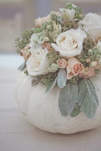 I LOVE the idea of scattering tiny white pumpkins throughout our wedding for a bit of whimsy and romance! Check out these 10 Pumpkin Wedding Decor Ideas.