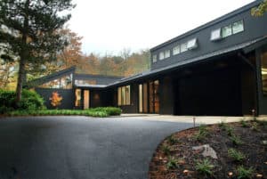 Looking for exterior home inspiration? Check out these 15 Modern Rustic Homes with Black Exteriors! MountainModernLife.com