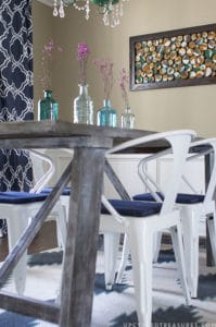 Looking for creative, affordable wall art ideas? See how easy it is to reimagine fallen branches into wood slice art! MountainModernLife.com