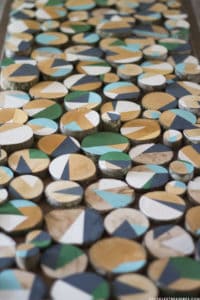 Looking for creative, affordable wall art ideas? See how easy it is to reimagine fallen branches into wood slice art! MountainModernLife.com