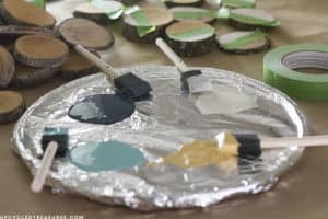 Looking for creative, affordable wall art ideas? See how easy it is to reimagine fallen branches into wood slice art! MountainModernLife.com