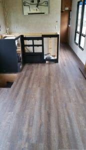 Planning to replace the flooring in your RV or camper? After some trial and error we are sharing some tips to replace the flooring Inside a RV slide out | MountainModernLife.com