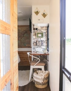 See how we added character and function to our RV by creating a wall-mounted desk from reclaimed wood. MountainModernLife.com