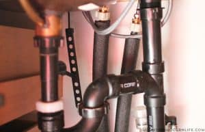 pipes covered with foam insulation in rv during winter mountainmodernlife.com