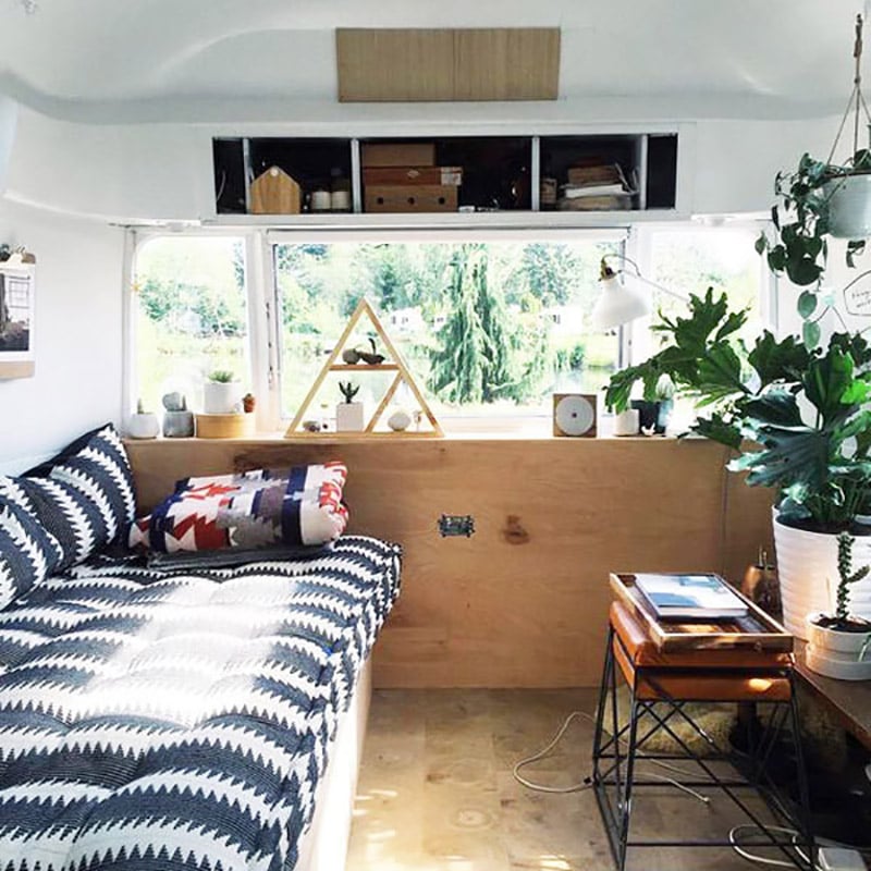 If white paint, various wood tones, and lots of texture is your thing, you'll love these rustic camper remodels! Photo Source: Tin Can Homestead