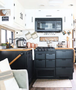 Looking for ways to maximize the space in your RV? Here are some tips for Organizing a Tiny Kitchen! MountainModernLife.com