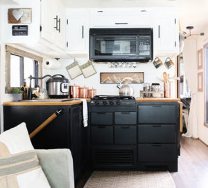 Looking for ways to maximize the space in your RV? Here are some tips for Organizing a Tiny Kitchen! MountainModernLife.com