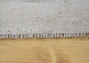 Looking for ways to add warmth and texture to your home or RV? See how easy it is to make burlap roller shades! MountainModernLife.com