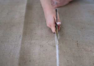 Looking for ways to add warmth and texture to your home or RV? See how easy it is to make burlap roller shades! MountainModernLife.com