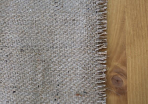 Looking for ways to add warmth and texture to your home or RV? See how easy it is to make burlap roller shades! MountainModernLife.com