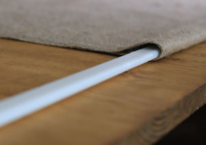 Looking for ways to add warmth and texture to your home or RV? See how easy it is to make burlap roller shades! MountainModernLife.com