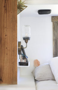 See how easy it is to make a Mason Jar wall light fixture with a dimmer switch, perfect for adding a rustic touch to your home or RV! MountainModernLife.com