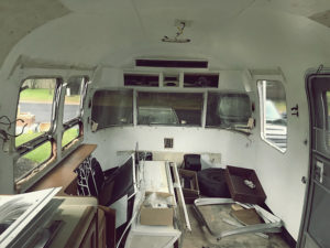 Tour this Renovated Airstream from Trailer Trashin' with Modern Finishes and Tropical Vibes! Featured on MountainModernLife.com