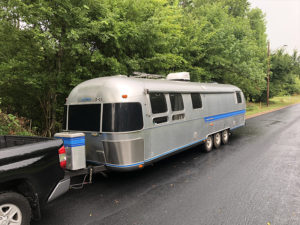 Tour this Renovated Airstream from Trailer Trashin' with Modern Finishes and Tropical Vibes! Featured on MountainModernLife.com