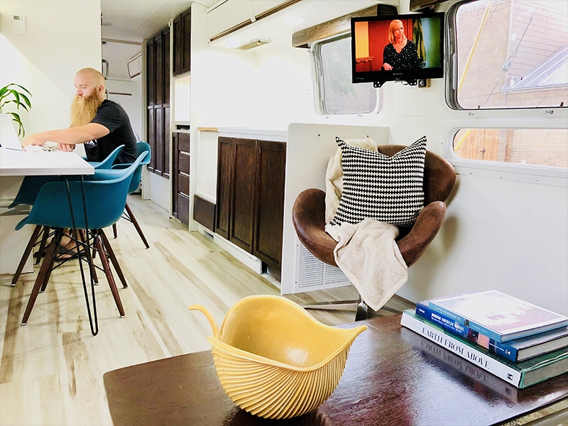 Tour this Renovated Airstream from Trailer Trashin' with Modern Finishes and Tropical Vibes! Featured on MountainModernLife.com