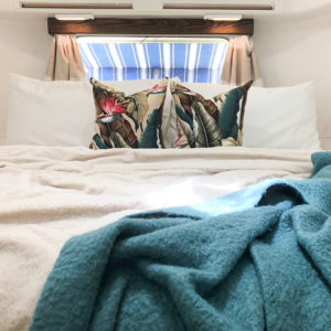 Tour this Renovated Airstream from Trailer Trashin' with Modern Finishes and Tropical Vibes! Featured on MountainModernLife.com