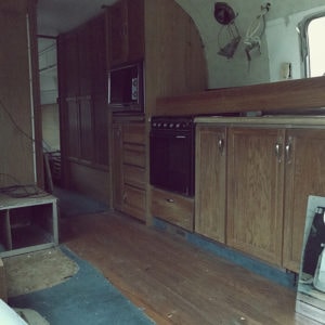 Tour this Renovated Airstream from Trailer Trashin' with Modern Finishes and Tropical Vibes! Featured on MountainModernLife.com
