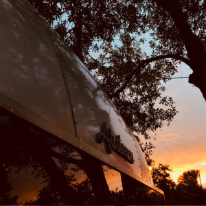 Tour this Renovated Airstream from Trailer Trashin' with Modern Finishes and Tropical Vibes! Featured on MountainModernLife.com