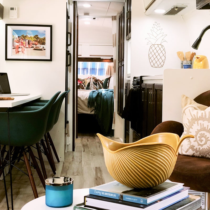 Tour this Renovated Airstream from Trailer Trashin' with Modern Finishes and Tropical Vibes! Featured on MountainModernLife.com