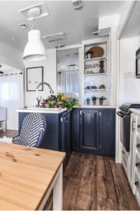 Camper Tour: See how @RVFixerUpper transforms drab 5th wheels into stylish tiny homes! MountainModernLife.com #rvrenovation #campertour