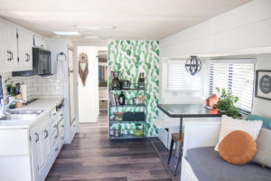Tour this boho-inspired RV renovated for a family of 4 that's currently for sale! Photos from @CaitiJackson #campervibes #RVreno