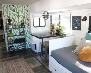 Tour this boho-inspired RV renovated for a family of 4 that's currently for sale! Photos from @CaitiJackson #campervibes #RVreno