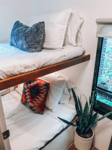 Tour this renovated camper inspired by international travel! // Photos from: ems_traveldiary on Instagram // Featured on MountainModernLife.com