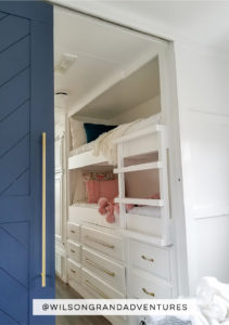 Tour this remodeled RV filled with lots of white, shiplap, and warm wood tones from @WilsonGrandAdventures! Featured on MountainModernLife.com