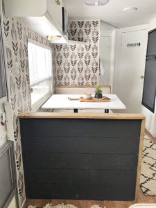 Tour this budget-friendly farmhouse camper that was transformed for $500 by Proverbs31Girl! Featured on MountainModernLife.com