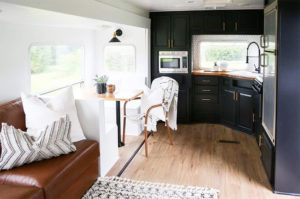 Tour this kid-friendly modern rustic camper created by a husband and wife design team, @Joinery&DesignCo! Featured on MountainModernLife.com #camperreno #campermakeover #camperremodel #tinyhometour #modernrustic