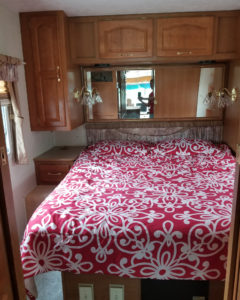 Tour this modern yet cozy renovated RV filled with lots of white, shiplap, and warm wood tones from @WilsonGrandAdventures! Featured on MountainModernLife.com