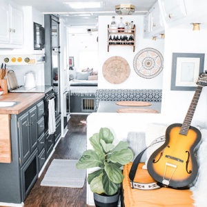 This couple lives on a blueberry farm in their bohemian-inspired RV! View the tour from @TheRamblrRV on MountainModernLife.com