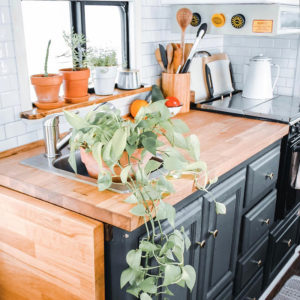 This couple lives on a blueberry farm in their bohemian-inspired RV! View the tour from @TheRamblrRV on MountainModernLife.com
