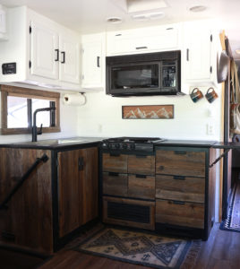 Considering adding black kitchen countertops to your home? Come see how we updated butcher block countertops for a rustic modern vibe in our RV. MountainModernLife.com