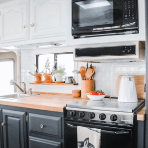 This couple lives on a blueberry farm in their bohemian-inspired RV! View the tour from @TheRamblrRV on MountainModernLife.com