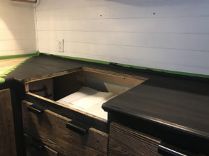 Considering adding black kitchen countertops to your home? Come see how we updated butcher block countertops for a rustic modern vibe in our RV. MountainModernLife.com