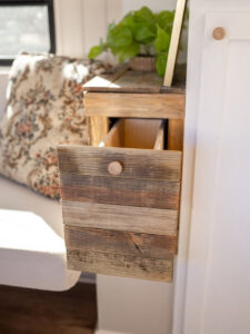 rustic reclaimed wood drawer inside camper