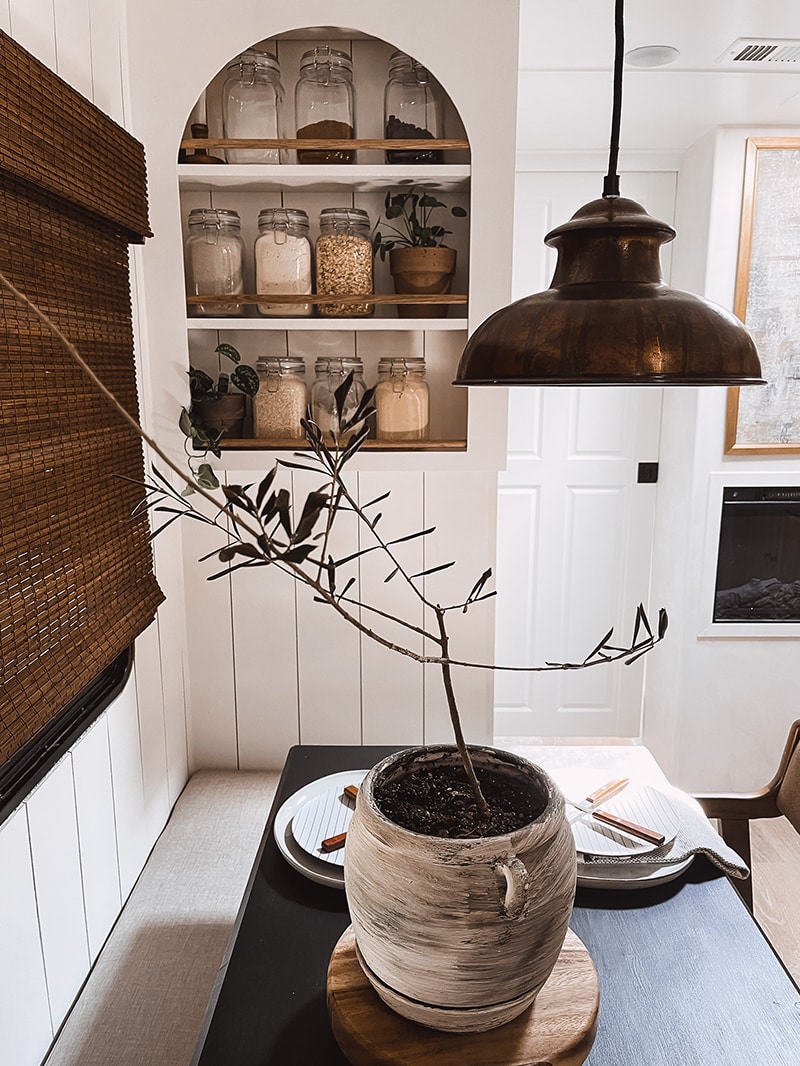 You’ll want to cozy up to the earthy hues and organic textures in this renovated Monaco Motorhome