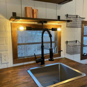 camper kitchen with framed window