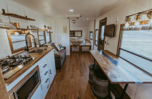 cozy camper remodel with river table