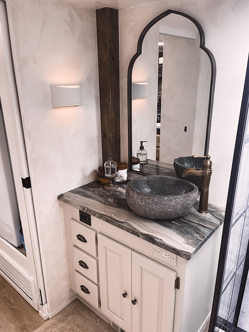 You’ll want to cozy up to the earthy hues and organic textures in this renovated Monaco Motorhome