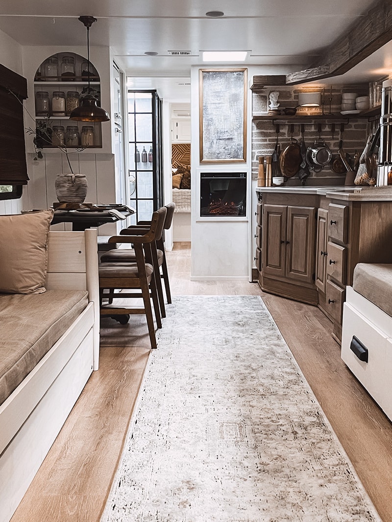 You’ll want to cozy up to the earthy hues and organic textures in this renovated Monaco Motorhome