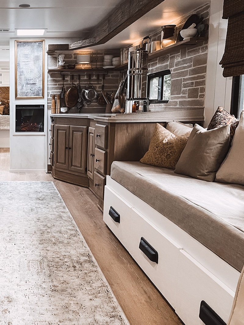 You’ll want to cozy up to the earthy hues and organic textures in this renovated Monaco Motorhome