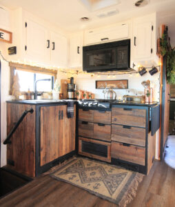 RV kitchen with reclaimed cabinets