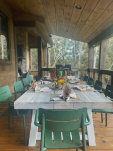 tablescape on deck of mountain home in Blue Ridge