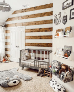 nursery with rustic wood accent wall